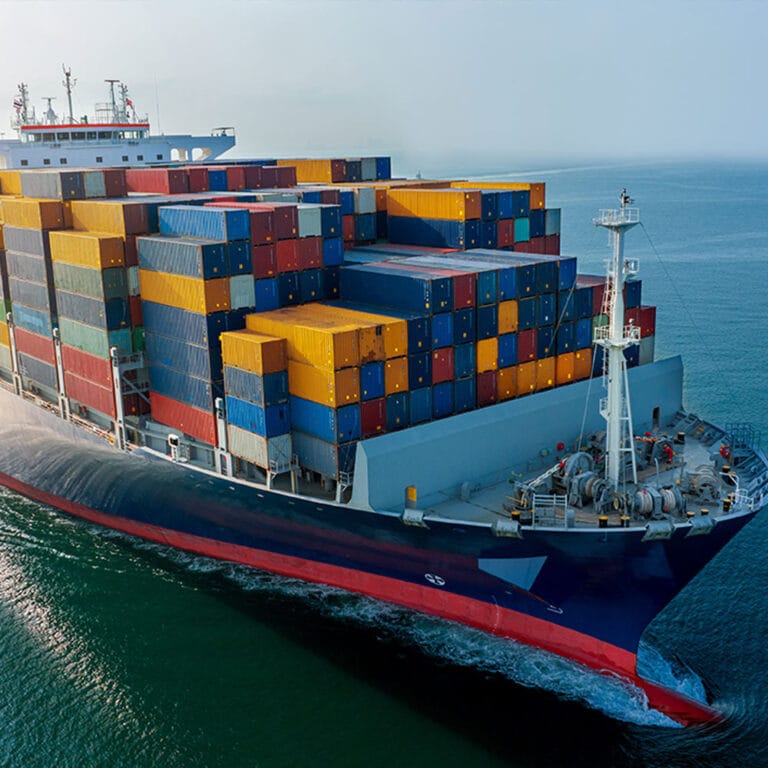 Container ship loaded with cargo at sea