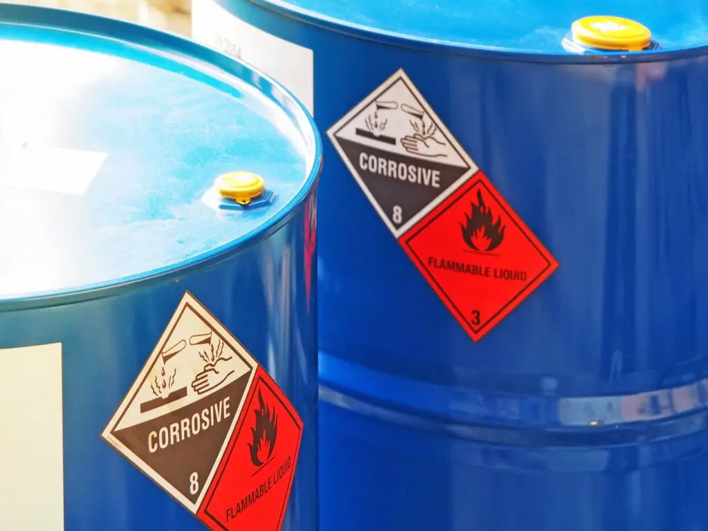 Close-up of a blue hazardous chemical warning label - Express Freight International dangerous goods consulting