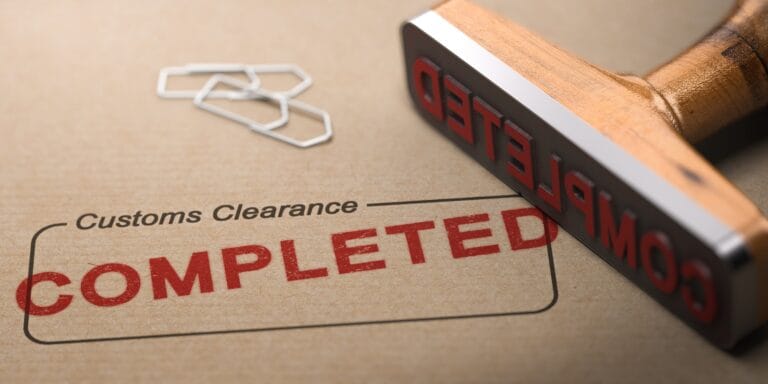 Illustration of a rubber stamp and the word completed