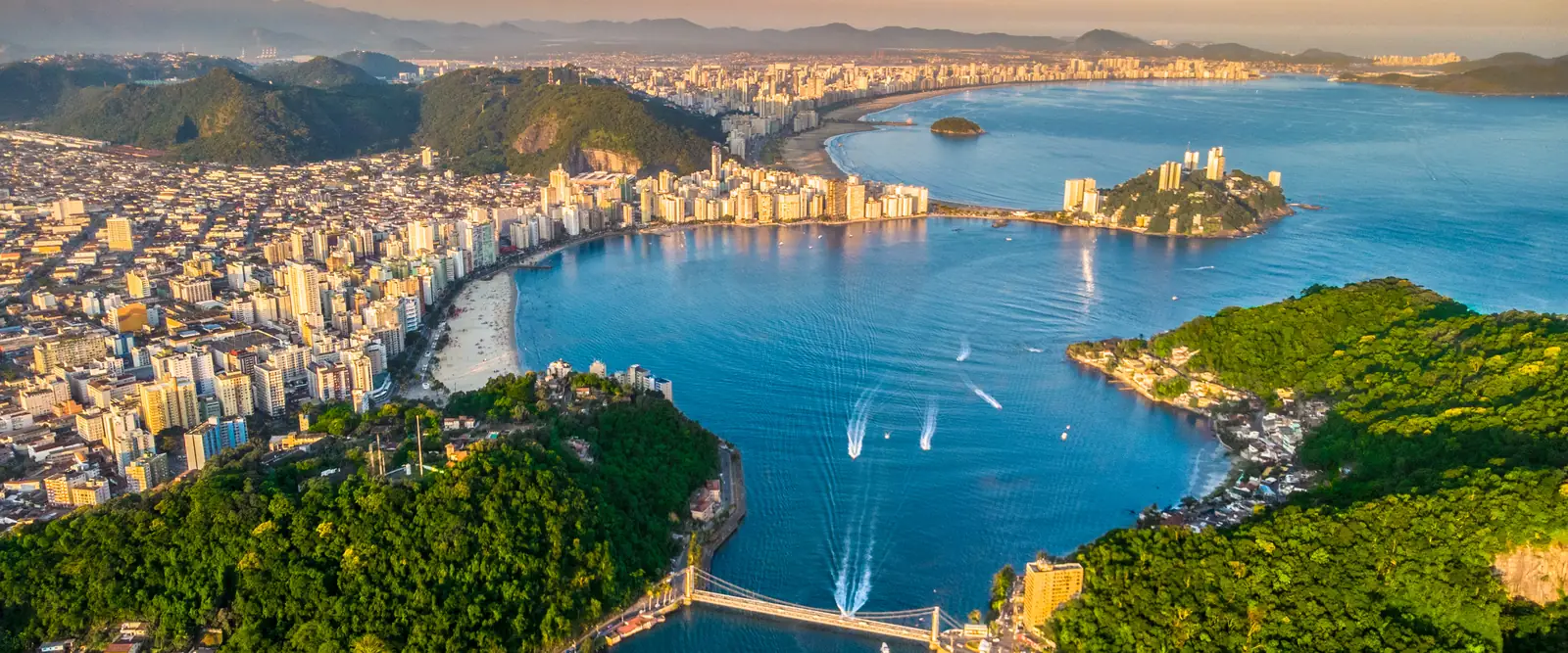 Aerial view of Santos and Sao Vicente on the Sao Paulo coast at sunset, the Brazilian end of the Miami to Brazil ocean freight lane