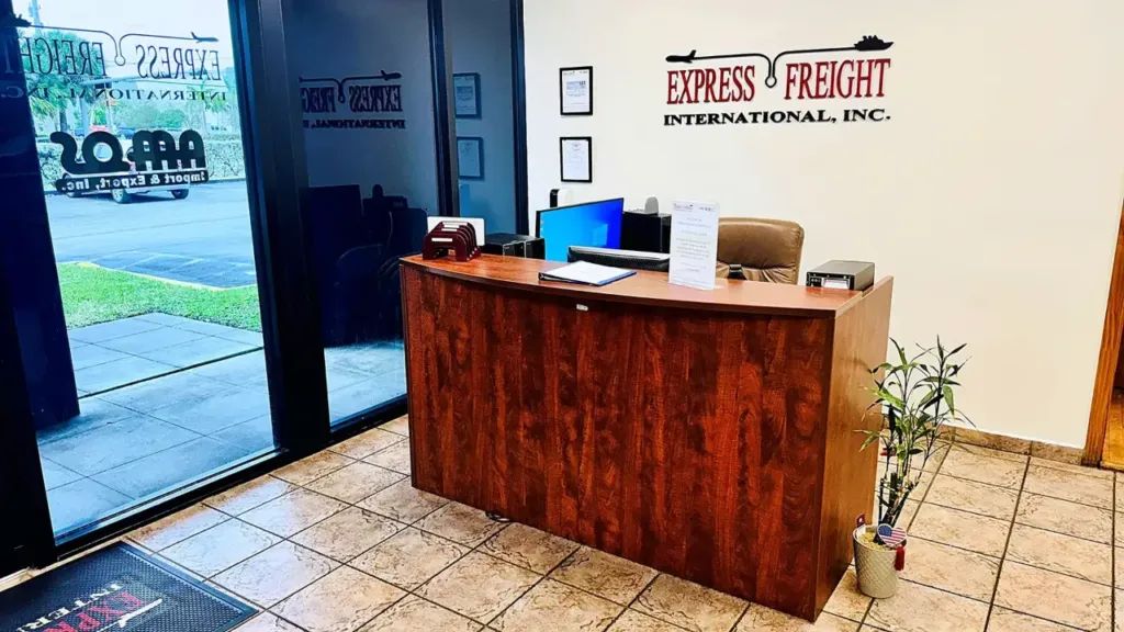 The front office at EFI in Medley, Miami, with the company sign on the wall above the reception desk