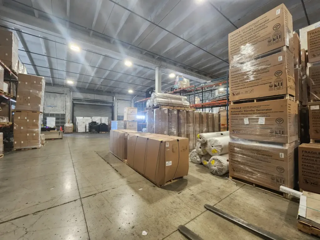 Export cargo staged along an aisle in the EFI warehouse in Miami.