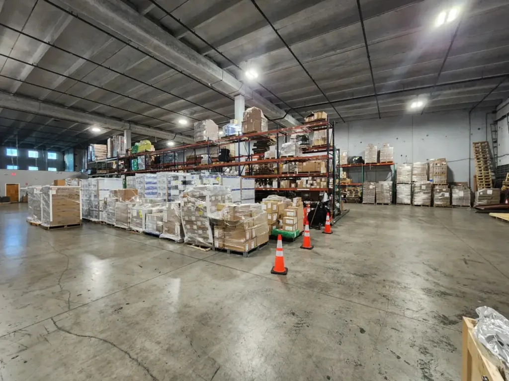 Palletized cargo and racked storage on the EFI warehouse floor in Medley, Miami