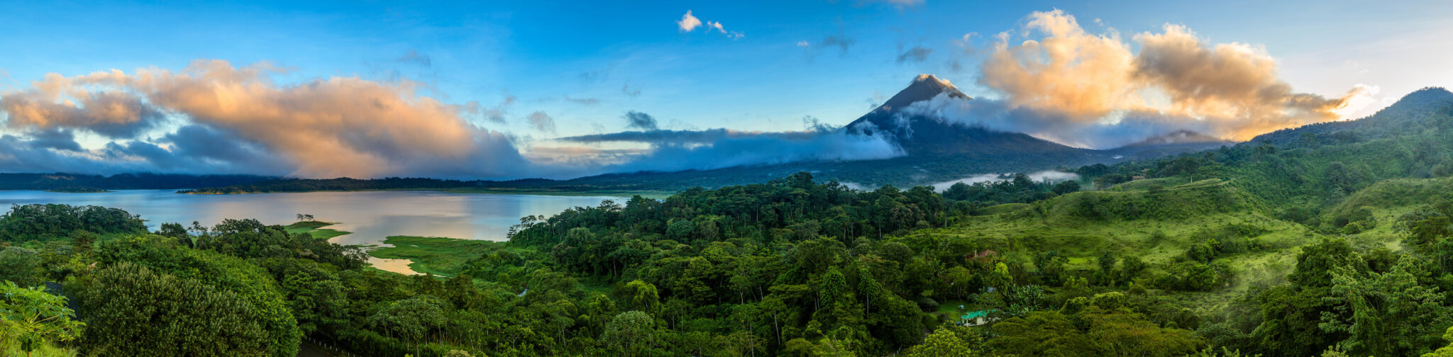 Panorama of Lake Arenal and Arenal Volcano in northern Costa Rica, above the rainforest