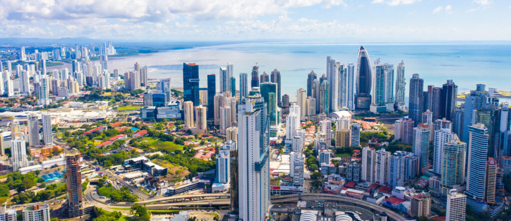 Aerial view of Panama City’s high-rise skyline along the Pacific coast